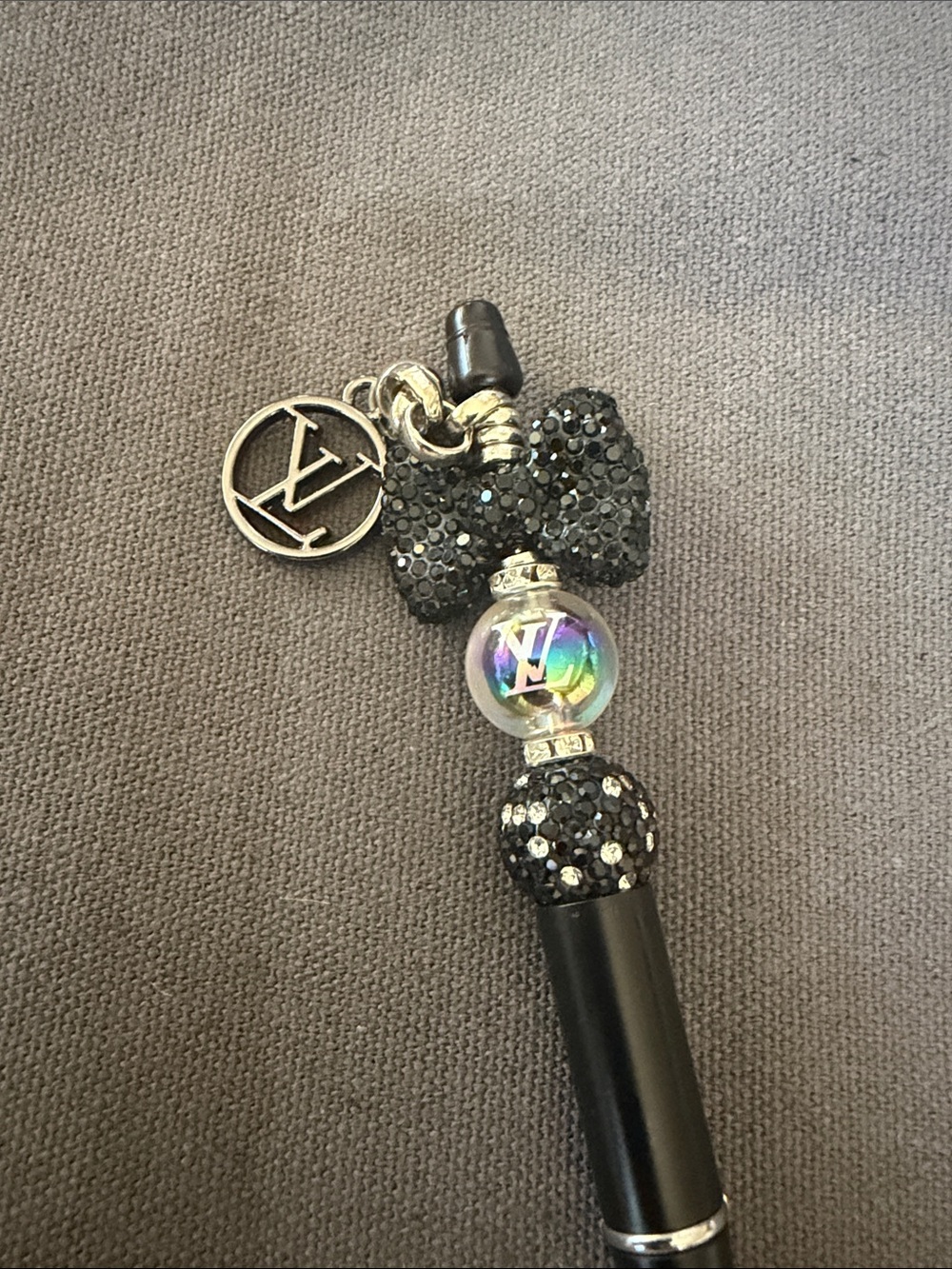 Handcrafted pen with stylish charm